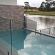 Frameless Glass Pool Fence to minimise impact on this beautiful outlook over the canal at Sunshine Cove